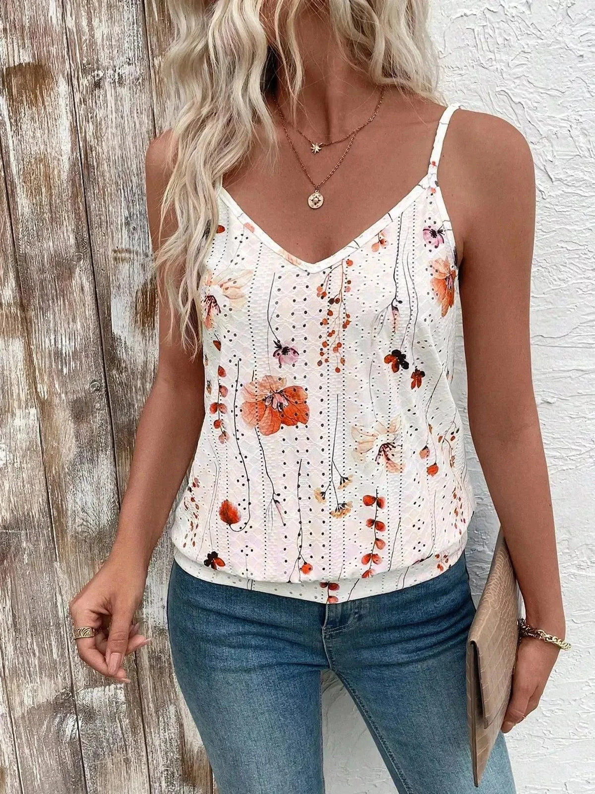 Floral Print V-Neck cami in white polyester with orange and black floral pattern, eyelet texture, and slim straps
