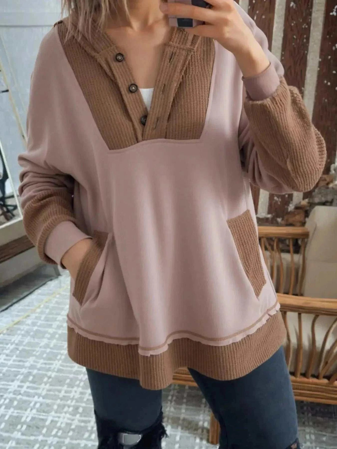 Oversize Waffle Patchwork hoodie in dusty pink with brown ribbed panels, buttoned neckline, and exposed seams