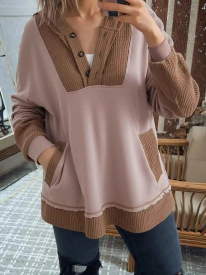 Oversize Waffle Patchwork hoodie in dusty pink with brown ribbed panels, buttoned neckline, and exposed seams