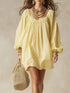 Flowy Balloon Sleeve Mini Dress in pale yellow polyester with ruched neckline and voluminous long sleeves