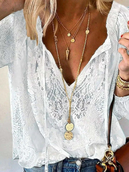 Lace Tie-Neck Blouse in white sheer lace, featuring a relaxed fit and front tie detail
