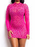 Rhinestone Embellished pink mesh mini dress with long sleeves, sheer panels, and a fitted silhouette