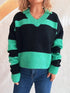 Color Block Long Sleeve Sweater in black and teal polyester with striped color-block pattern and ribbed V-neck cuffs
