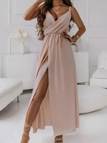 Honey Tied Surplice blush pink polyester maxi dress with a sleeveless wrap bodice, waist tie, and high slit