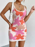 Spaghetti Strap Mini Dress in colorful abstract floral print with white trim and a fitted, sleeveless silhouette