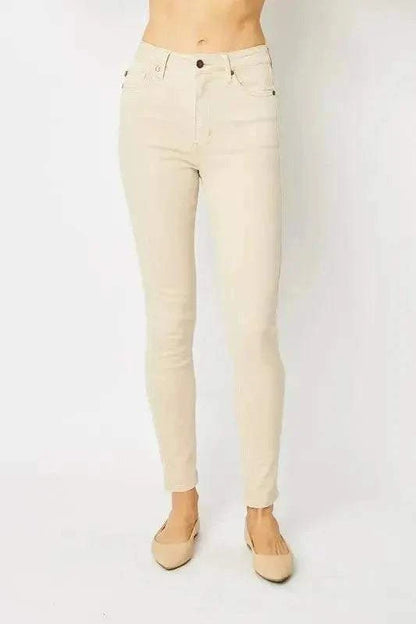 Garment Dyed Tummy Control Skinny Jeans in cream denim with a high-rise waist and slim, ankle-length fit
