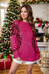Sequin Round Neck pink knit sweater with long sleeves and black sequin embellishments on the front sides