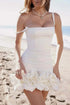 Ruched Square Neck white mini dress in stretchy fabric, featuring shoulder straps and a dramatic ruffled hem