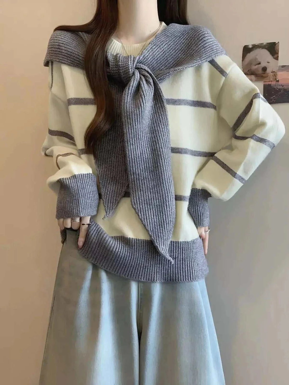 Striped Round Neck cream sweater with gray horizontal stripes, long sleeves, and tied knit scarf detail